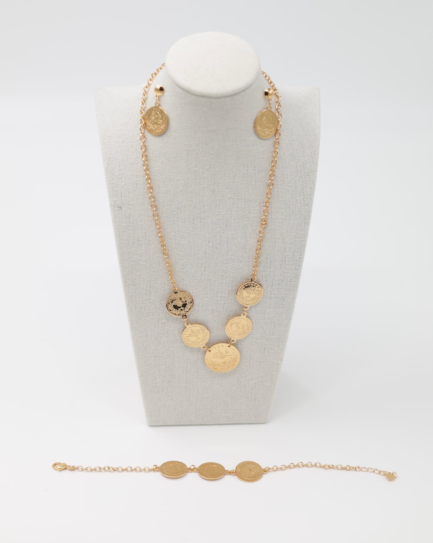 Necklace earrings and bracelet