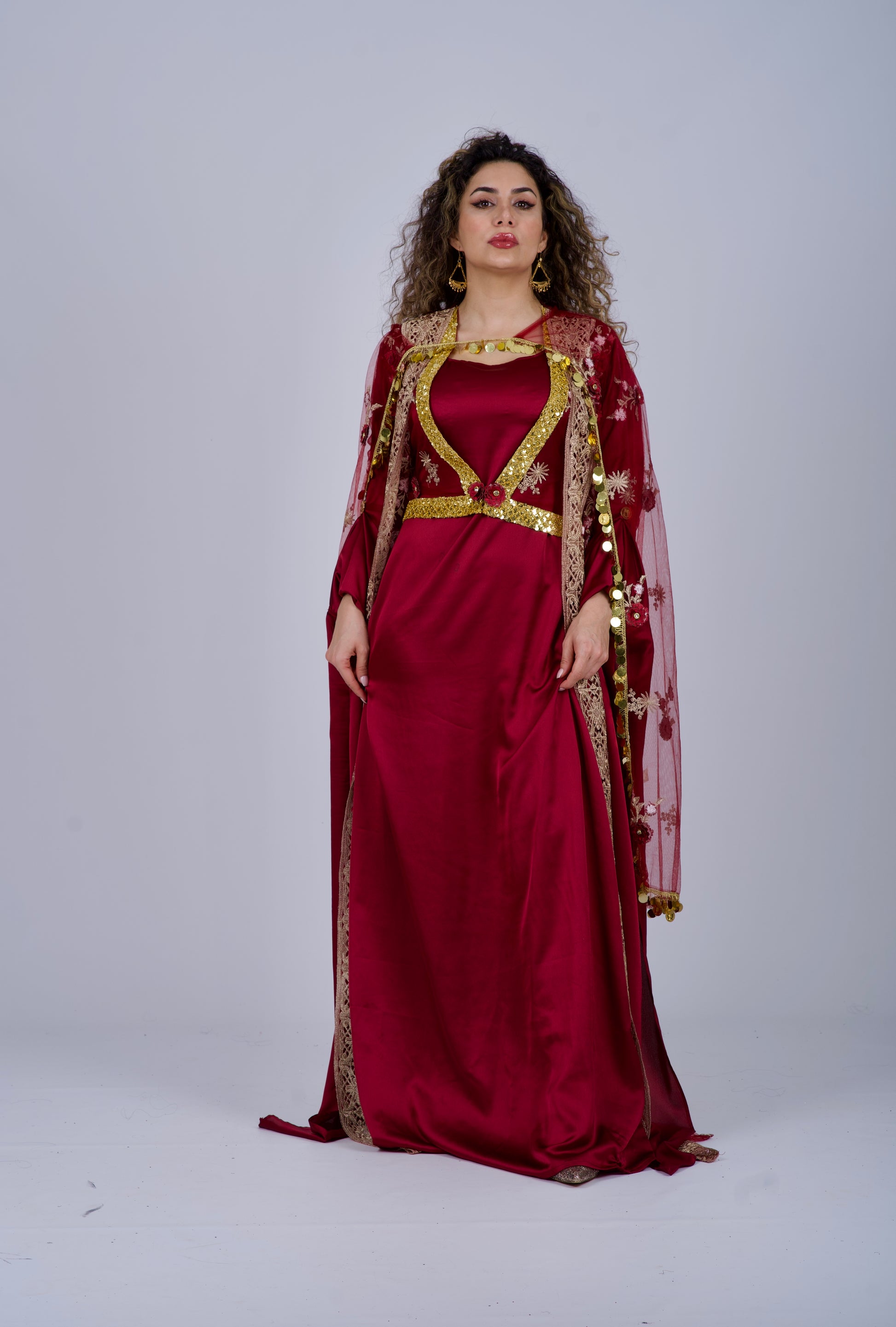 4-piece Kurdish dress set in a luxurious burgundy red wine shade, perfect for weddings, Newroz, and special events. Worldwide delivery available from Sweden.