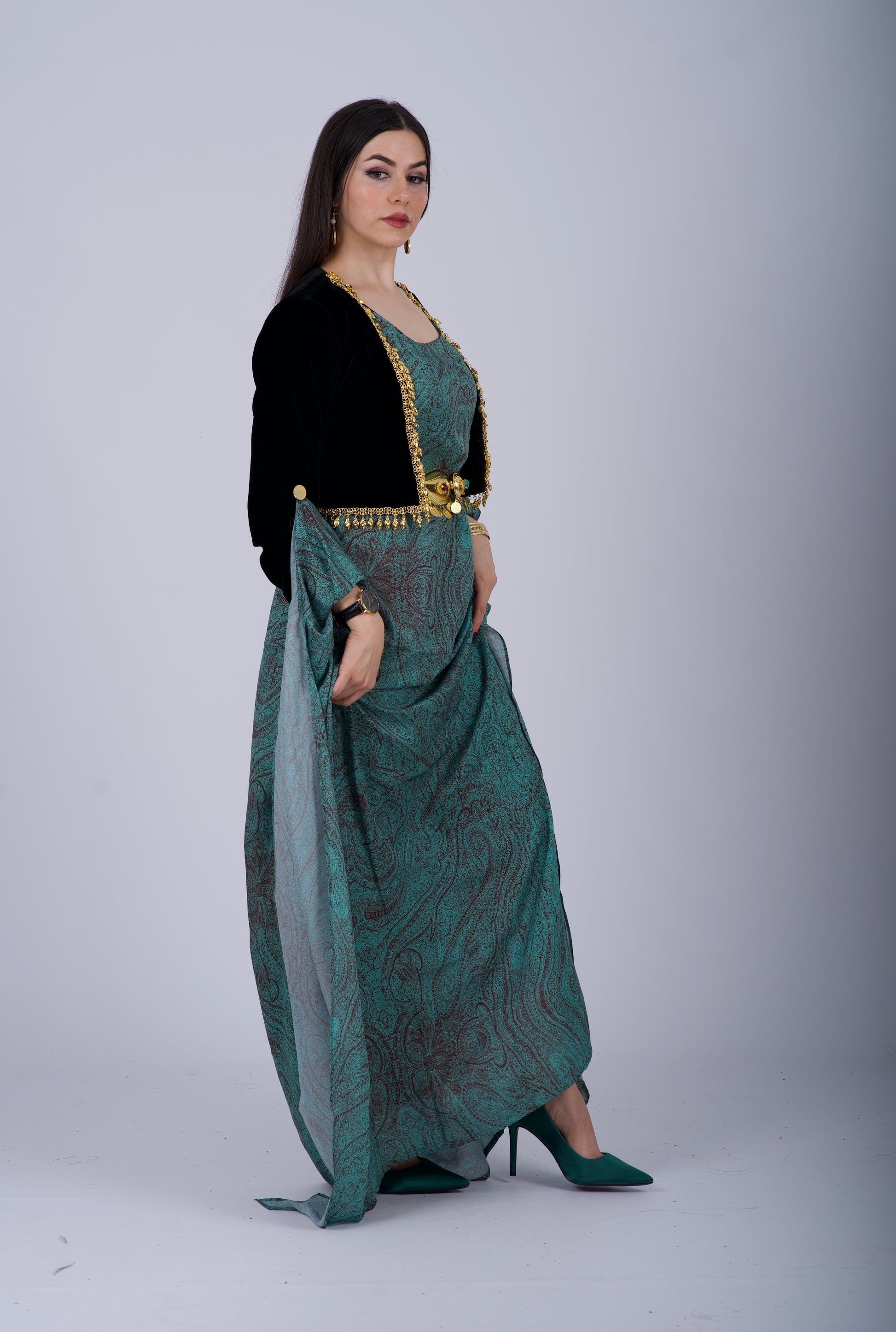 Premium Kurdish dress made of high-quality silk satin fabric with unique mango designs and black velvet details, perfect for formal occasions and cultural events.
