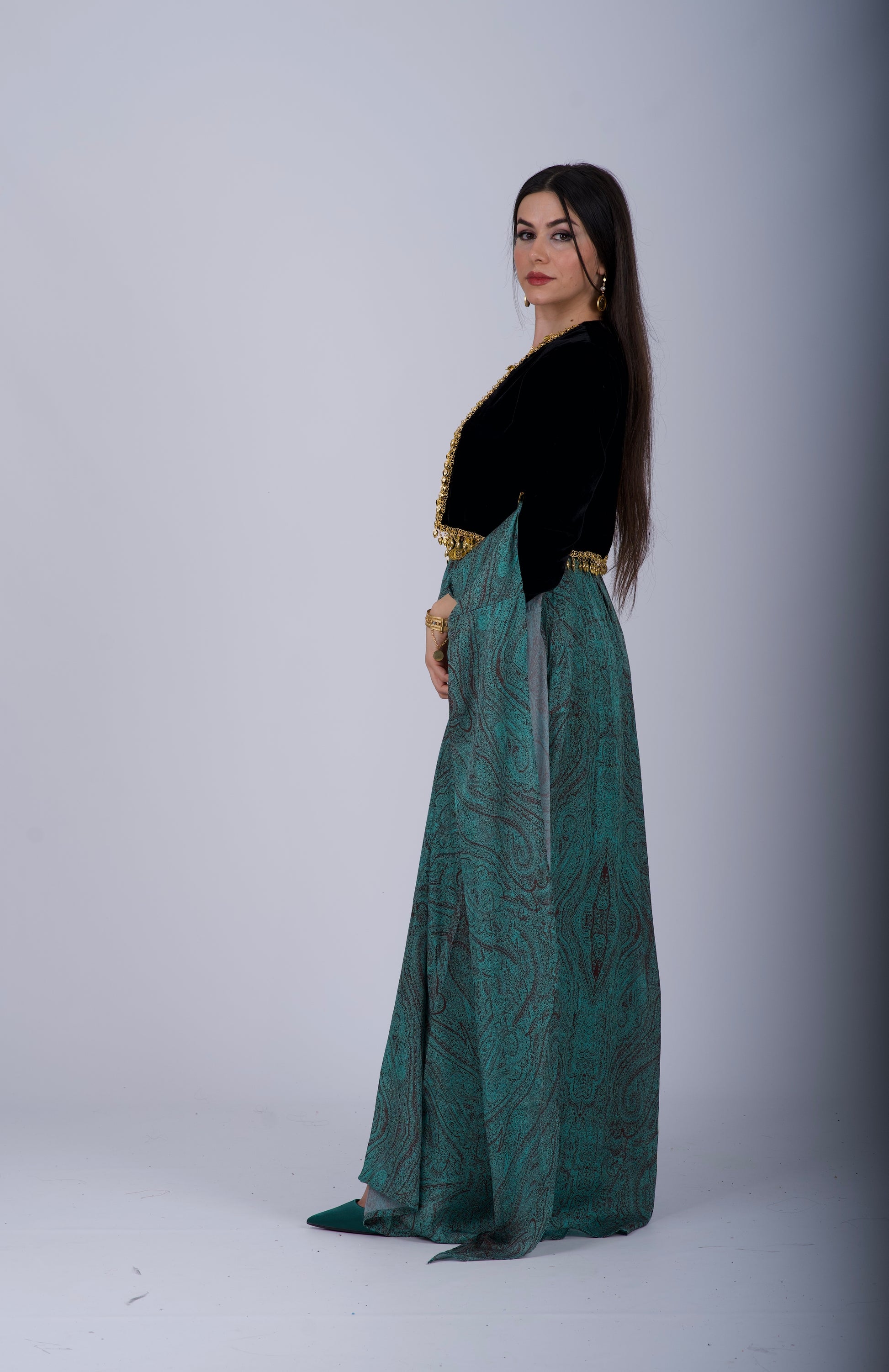 Beautiful Kurdish dress made from high-quality silk satin with unique mango designs and black velvet details, perfect for formal occasions and cultural events.