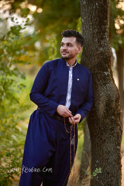 Handcrafted Tasbih from Hawraman and heart-shaped Kurdistan flag brooch, included with the Dark Navy Blue Complete Kurdish Men's Outfit Set, celebrating Kurdish culture and heritage