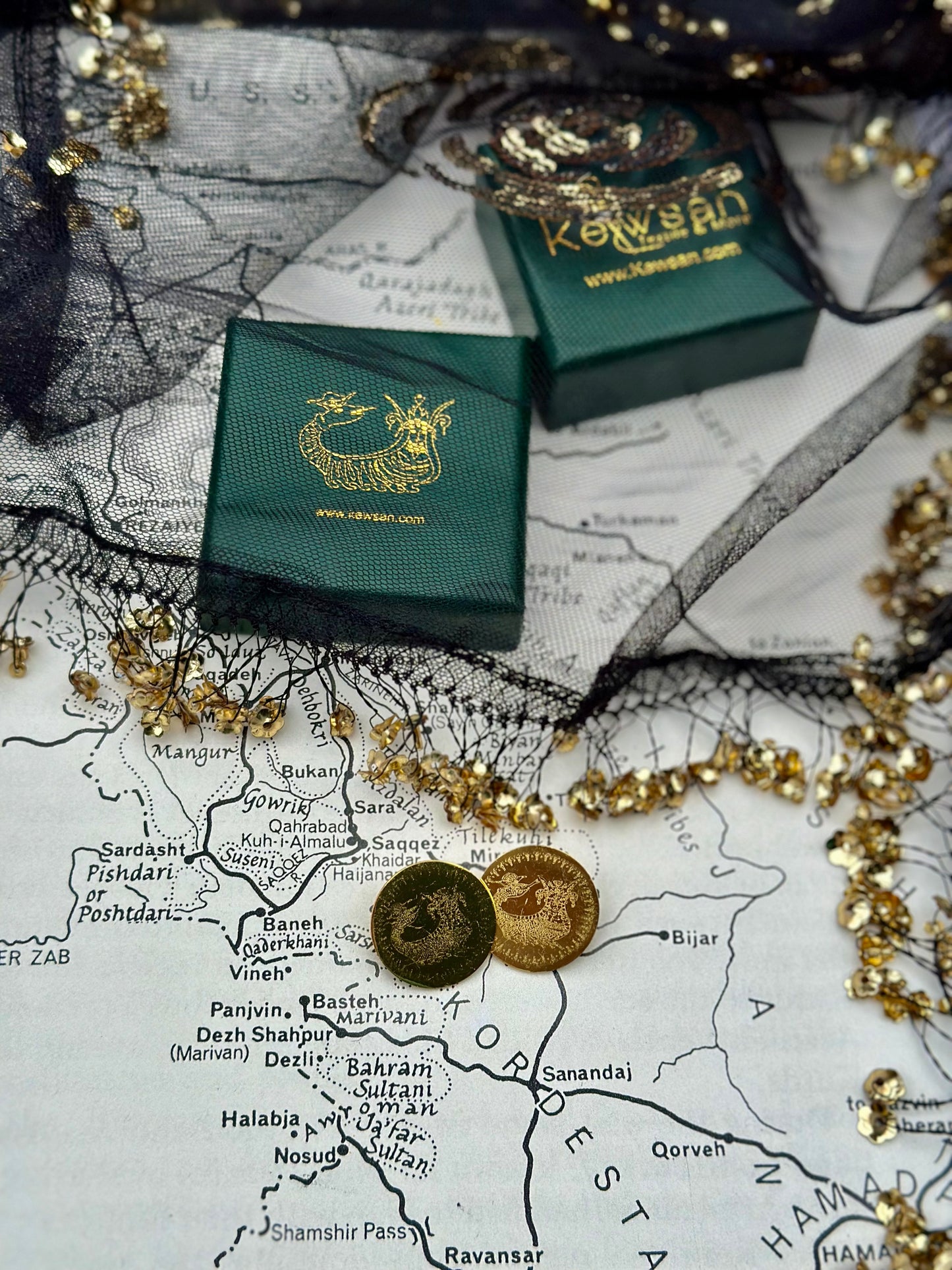 The Golden Shahmaran Brooch presented in a beautifully designed luxury box, perfect for gifting or safekeeping.