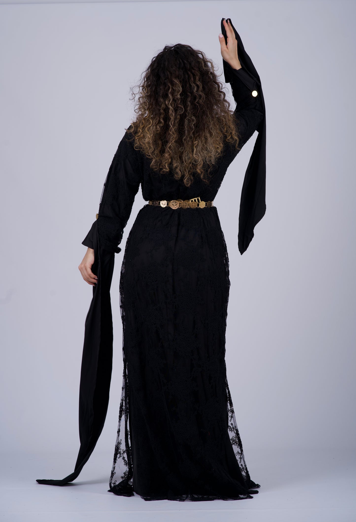 Midnight black Kurdish dress made from luxurious silk satin with elegant black embroidery, featuring an adjustable belt for a perfect fit. Ideal for Newroz and weddings.