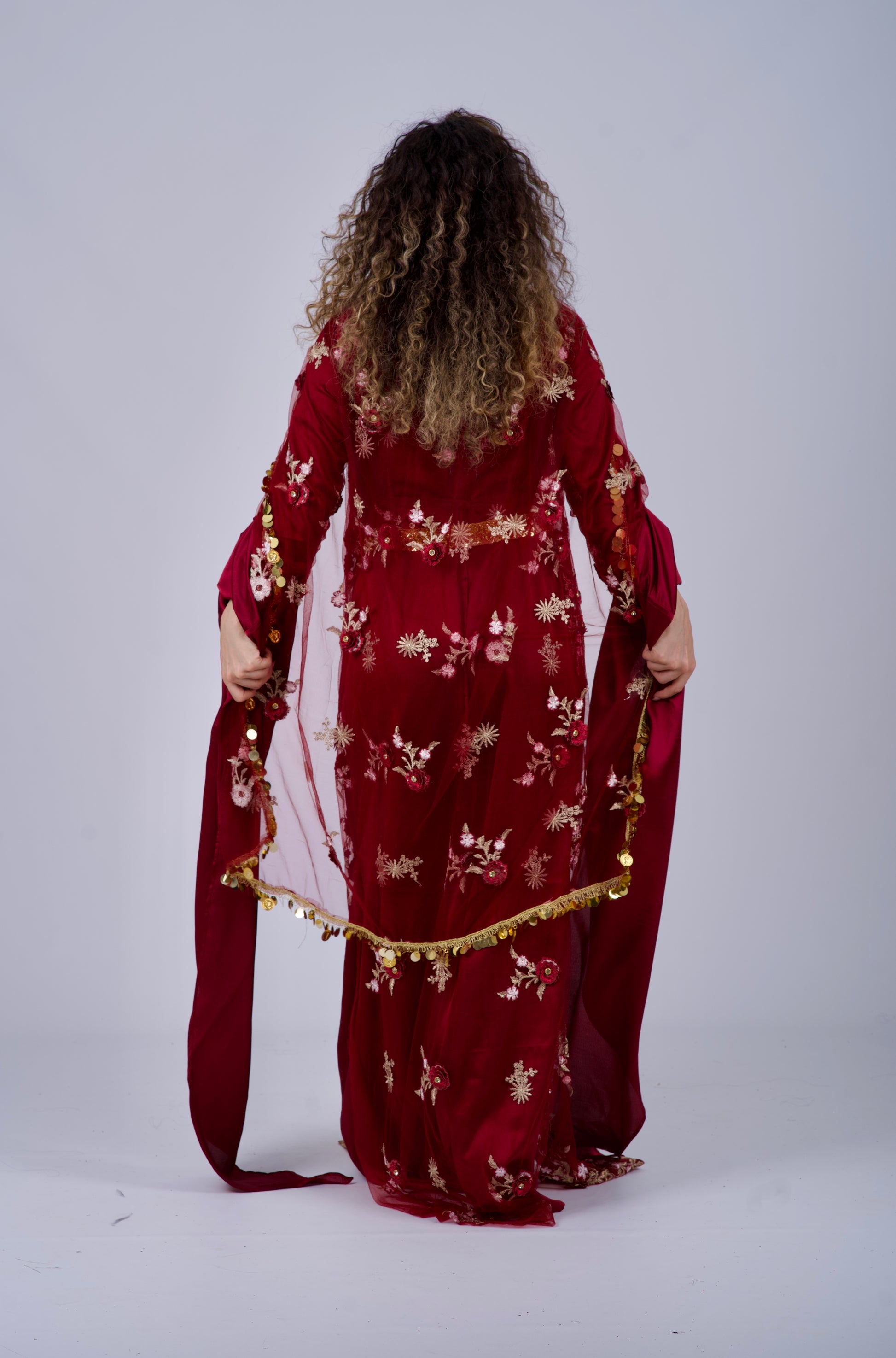 raditional Kurdish outfit in burgundy red wine, crafted from satin silk with 4 elegant pieces. Shipped globally, including Germany, Denmark, and the USA.