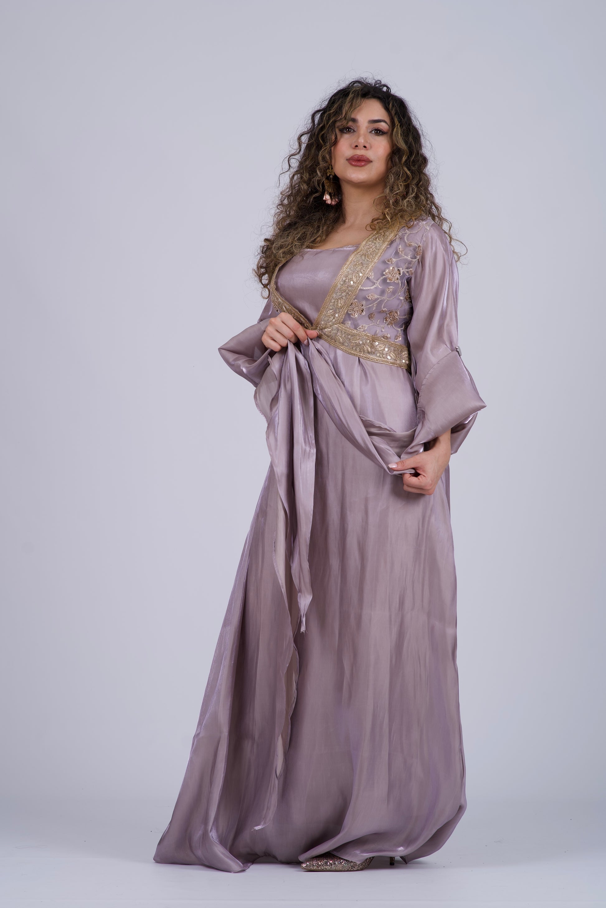 Elegant Kurdish dress with pastel purple-grey long coat featuring embroidery and crystals.