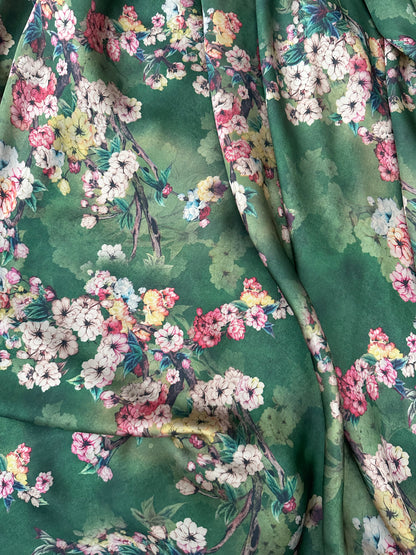 Wide 150 cm green floral silk satin fabric with luxurious texture for gowns and blouses