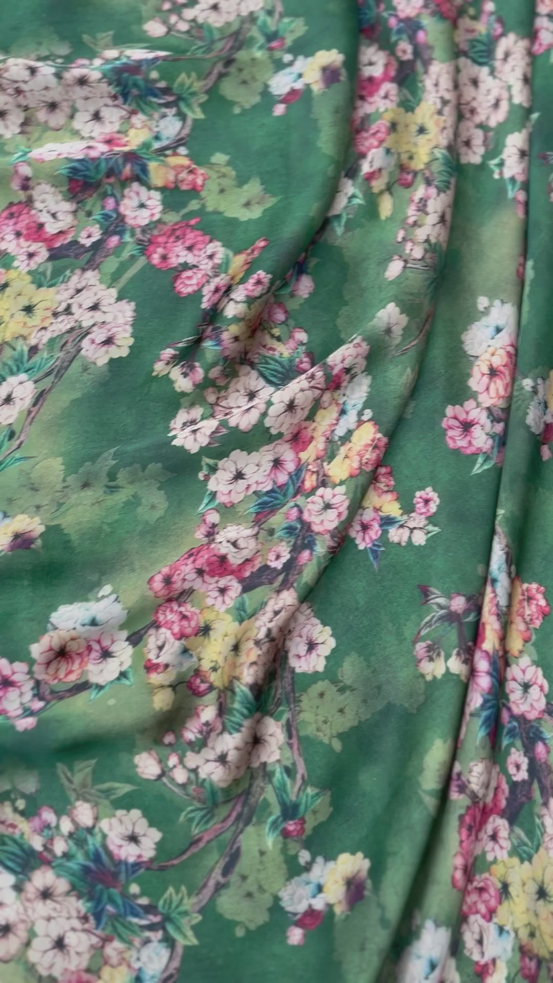 luxurious-green-floral-satin-fabric-draping-video