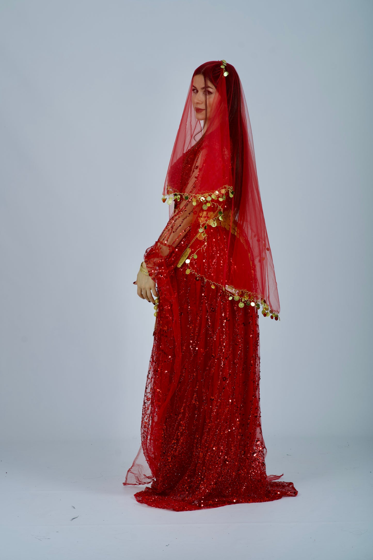 Complete set of the red Kurdish dress, including the Kawa, Kiras, and matching accessories for a traditional Kurdish wedding look.