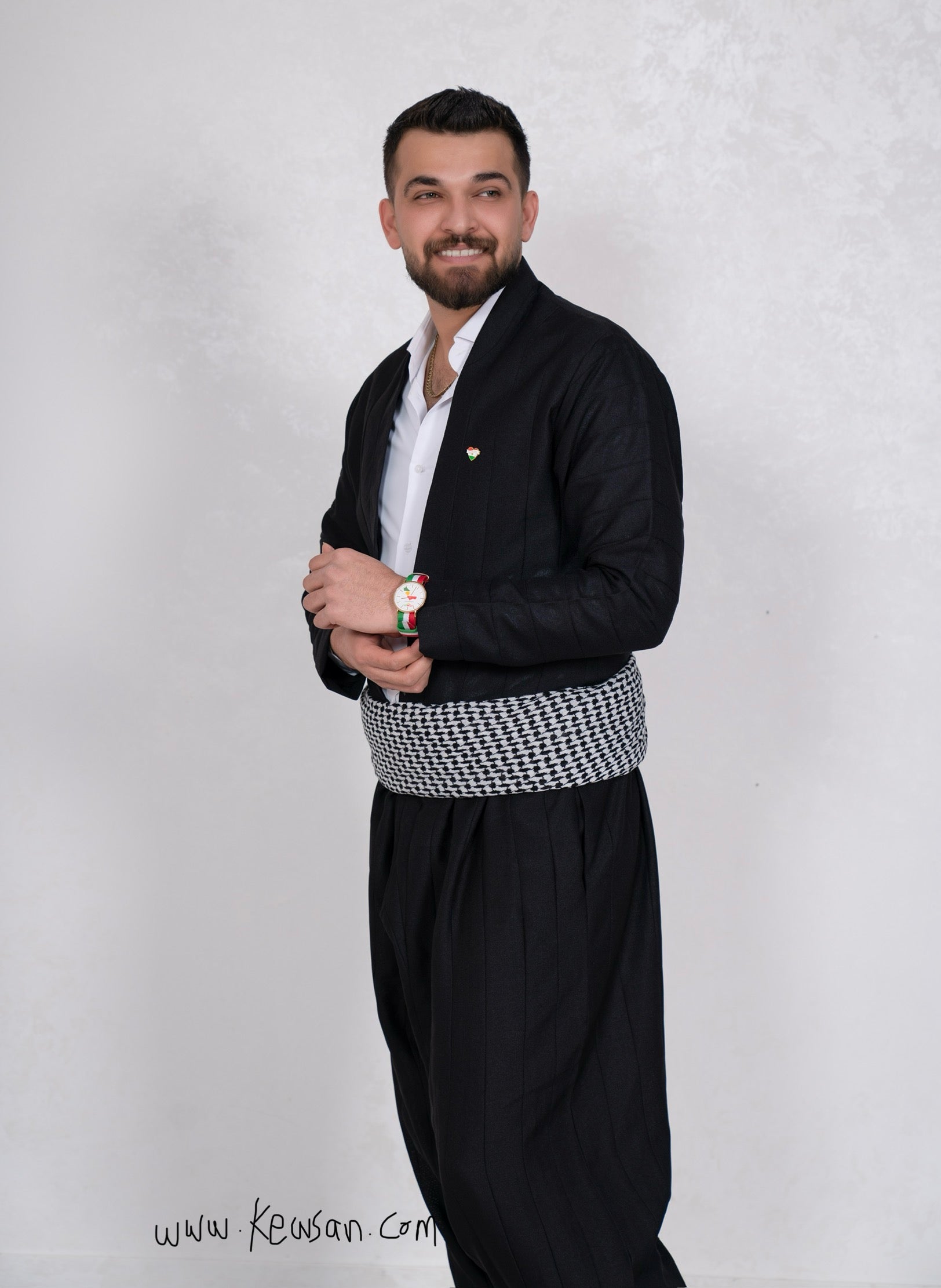 Side view of the Kurdish men’s outfit in Black, made from high-quality polyester, perfect for cultural events.