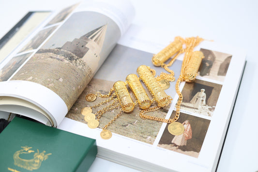 Close-up of Shamaran coin on Kurdish bridal necklace