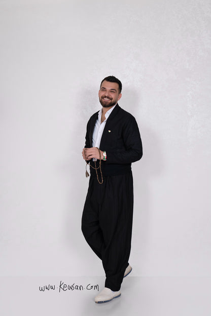 Model wearing the Hawraman Collection in Black, a modern adaptation of the traditional Shal u Shapik attire.