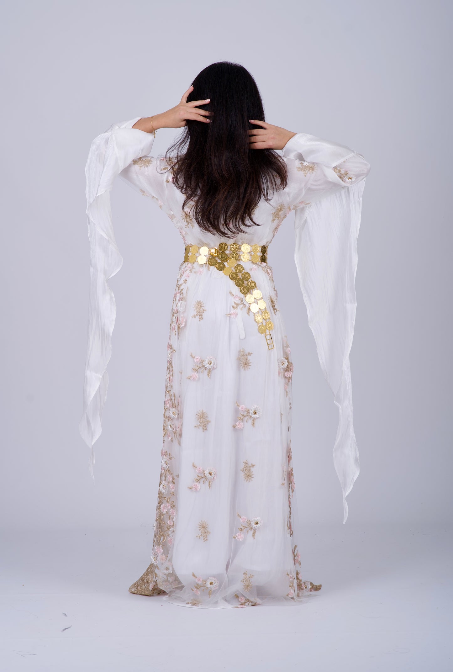 Stunning white Kurdish bridal dress set featuring 3D floral embroidery, a matching veil, and elegant Kawa, Kiras, and Helak vest. Ideal for Kurdish weddings and engagements.

